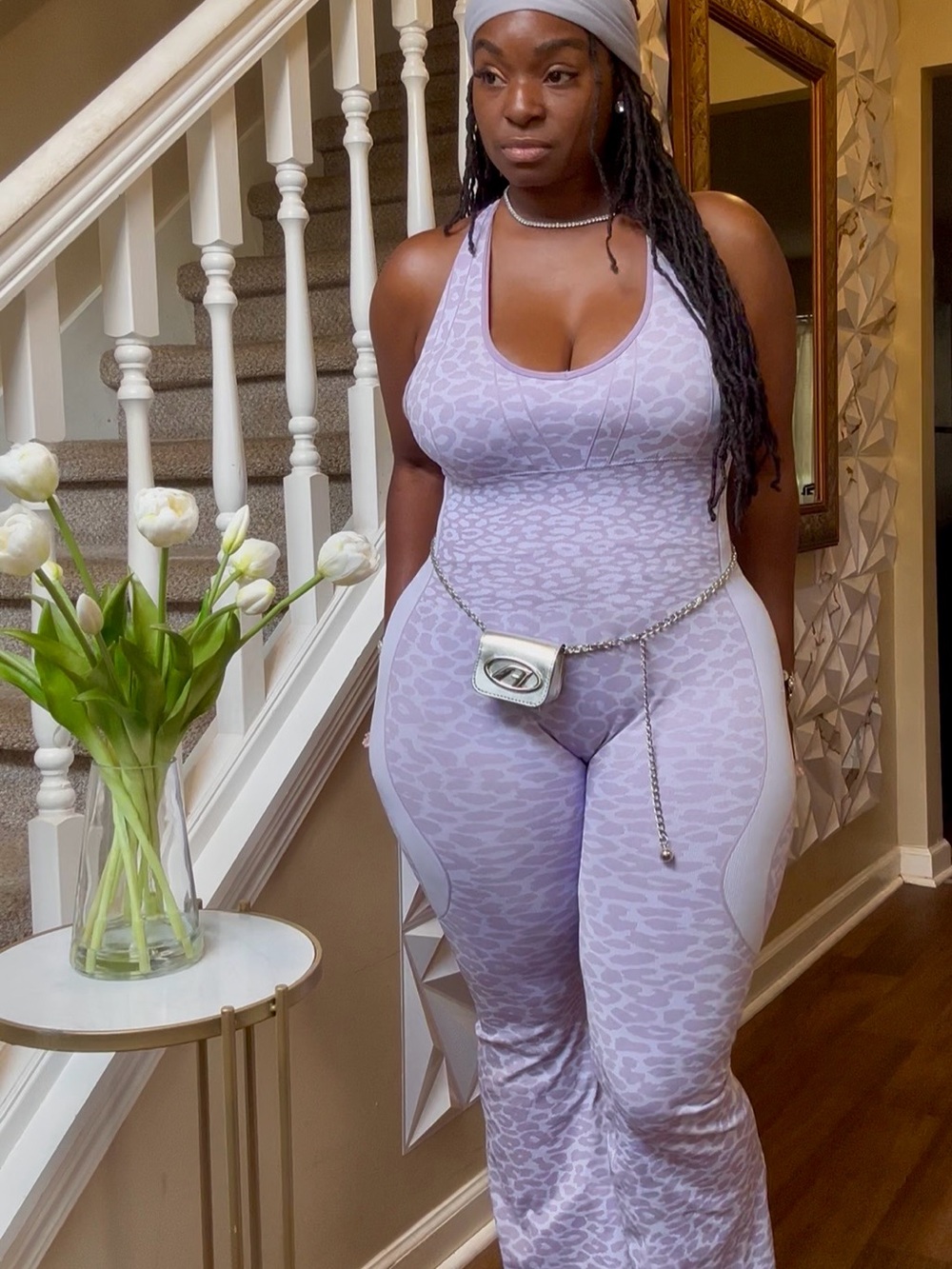 (Unbothered Luxe bodysuit )Lavender Animal-Print Flared Jumpsuit - Women's